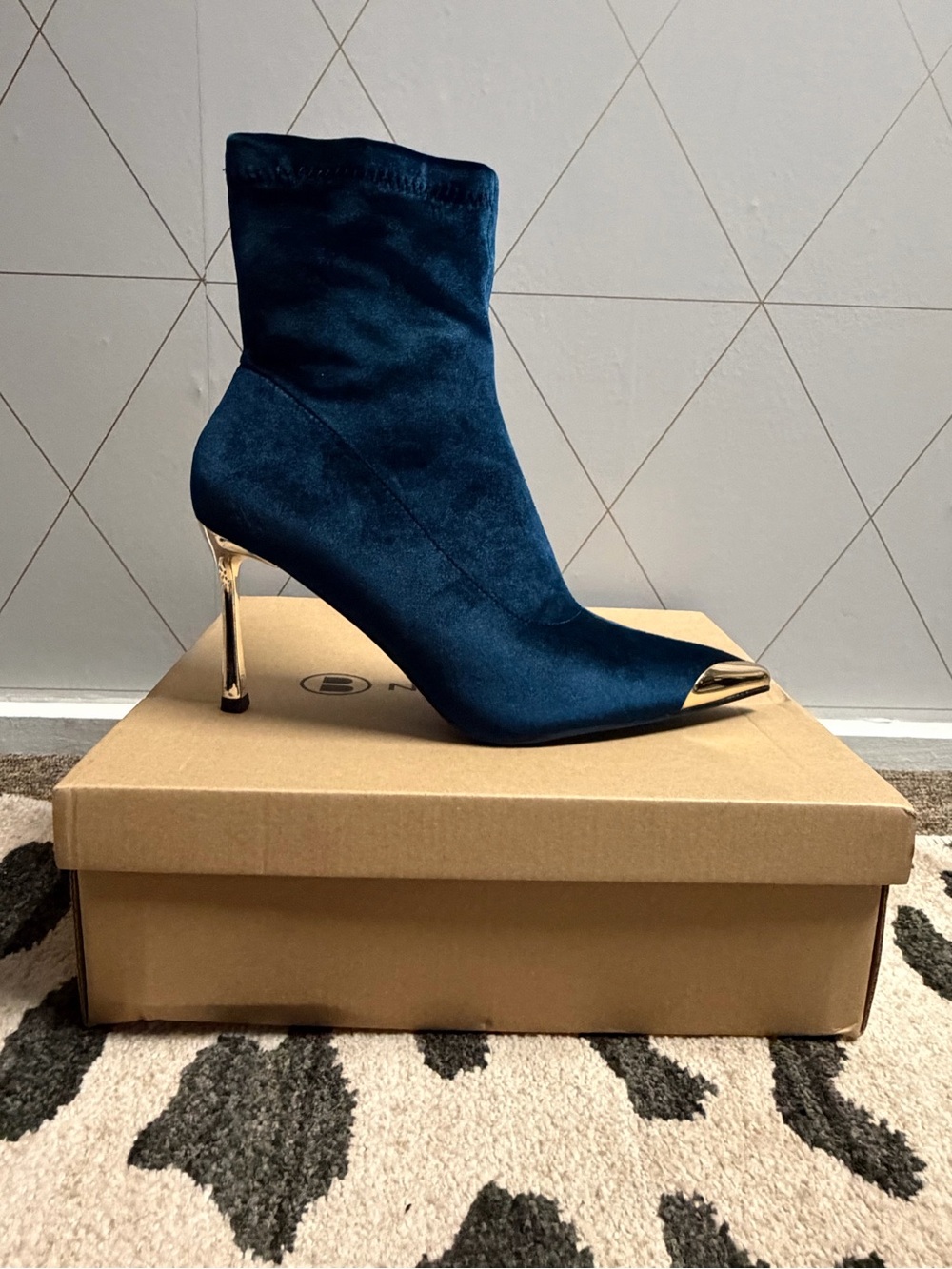 Elegant Navy Stiletto Sock Boot with Gold Heel and Cap